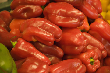 Display of Red Lucious Peppers in a produce market