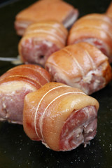 Fried porc on hot plate in market in France
