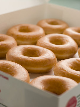 Iced Ring Doughnuts In A Tray