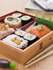 Sushi And Sashimi In A Take Away Bento Box