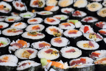 sushi plate with various filling close up.