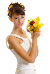 Happy bride with autumn bouquet isolated on white.
