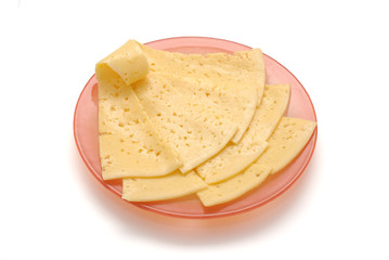 Cheese on the red glass plate isolated on the white background