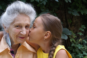 Granddaughter and her grandmother talking