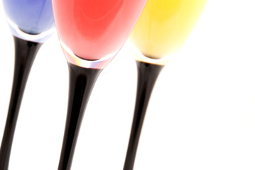 Three bent tall wine glass with colour water