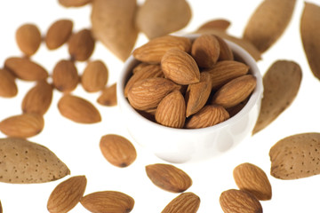 Almond nuts isolated on pure white background