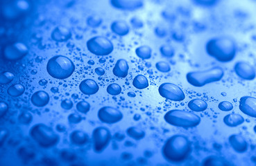 Blue water drops background texture