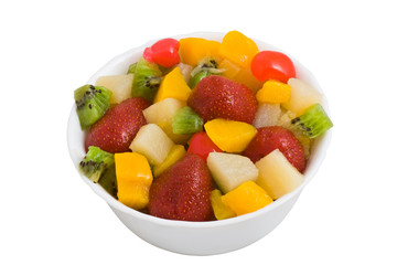 Colorful fruit salad isolated on white