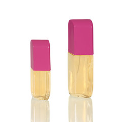 Two bottles of perfume on white background with reflection