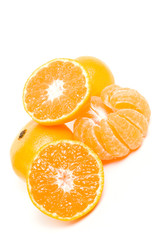 juicy tangerines on white background. vertical