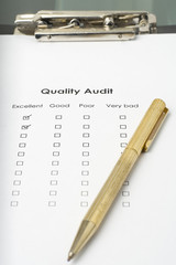 businessman filling out a questionnaire quality of service
