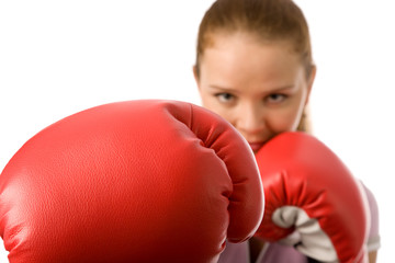 girl with red boxing gloves on a white background