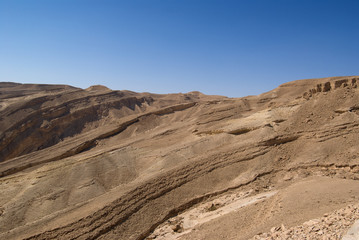 Fototapeta na wymiar Rough mountains landscape of the Israeli Negev Desert