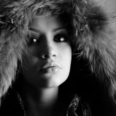 Tuinposter Fashion portrait of young pretty woman with fur © Egor Mayer
