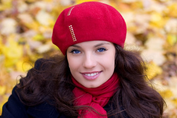 Girl with red roses in smiles