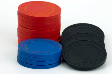 Red, blue and black poker chips