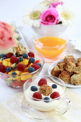 Healthy breakfast or snack with yogurt and fresh fruits