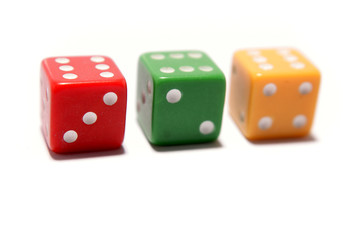 Three dice isolated over white