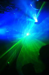 Fototapeta na wymiar Światła lasera w dyskotece