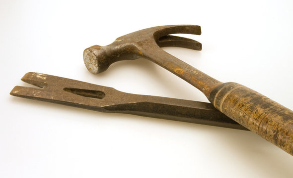 Old Steel Hammer And Worn Flat Prybar