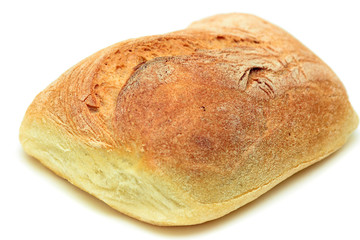 Typical home-made mediterranean bread isolated over white