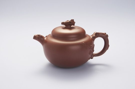 Chinese teapot on the white background