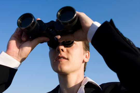 Man with binocular, focus on face