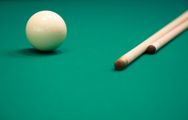 Billiard set on green table . Focus point on a ball