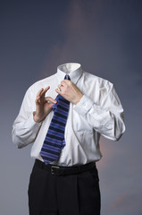 Businessman with no head for business