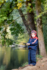 Cute 4 years old fisher boy