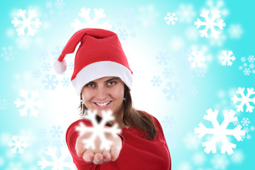santa woman holding small snowflake in the hand