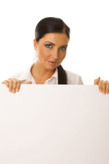 Beautiful business woman holding empty white board