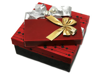 Dark red gift box with  ribbon isolated on the white