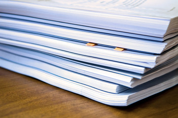 Piles of documents lying on a table