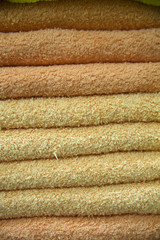 Fototapeta na wymiar close up of few orange Turkish towels