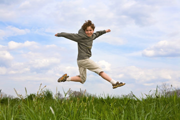 Boy running, jumping outdoor