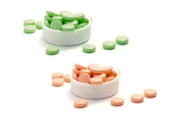 Color capsule pills isolated on white