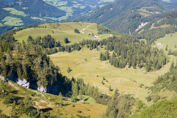 a view from the top of the alpine peak in the summertime