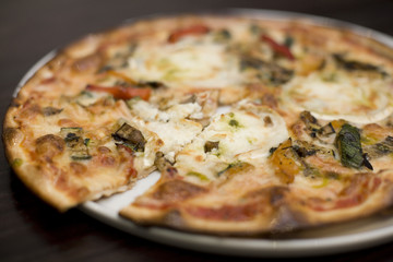 A Turkish style Goats cheese and roasted vegatable pizza