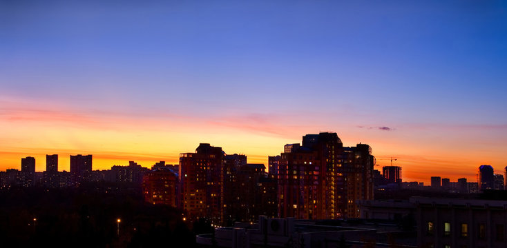 town is going to sleep, colored sunset in Moscow
