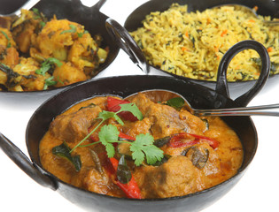 Lamb korma with vegetable curry and rice
