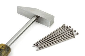 Hammer and nails isolated on white background