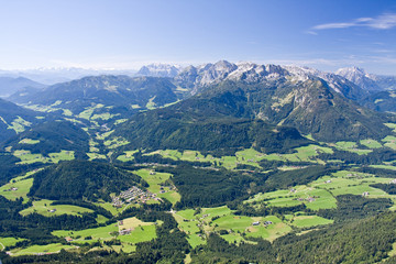 a view from the top of the alpine peak in the summertime