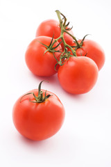 Five Tomatoes on white background