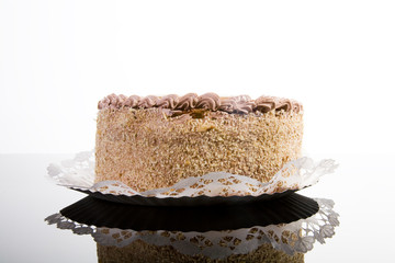 Caramel cake on a paper plate