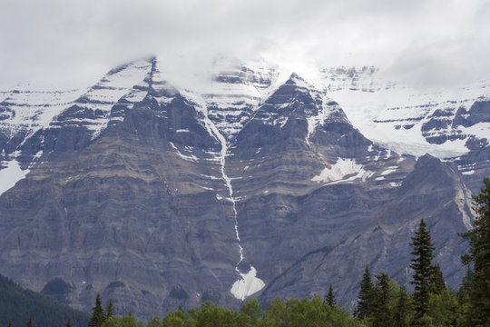 Mount Robson with snow and peak in clouds, Canada