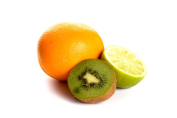 Orange, lime and kiwi on white background