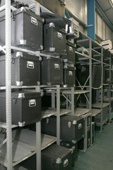 A metal rack of boxes in a warehouse.