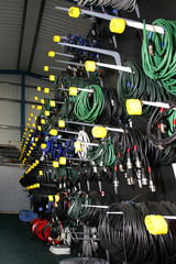 A rack of cables in a warehouse.