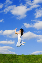pretty young woman is jumping